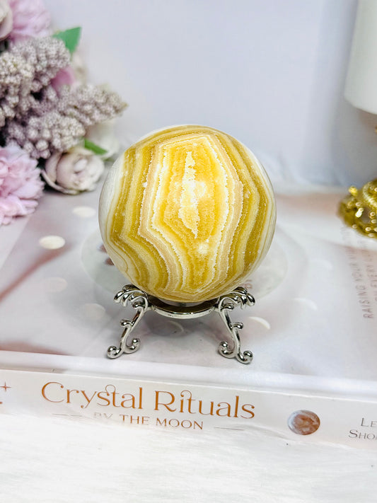 Orange Calcite Sphere on Stand 335g