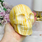 Large Orange Calcite Carved Skull 11.5cm 1.01KG