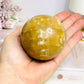 Large Amber Calcite Sphere on Stand 419g