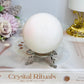 Large Mangano Calcite Sphere (UV Reactive) On Stand 420g