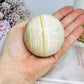 Large Banded Calcite Sphere on Stand 413g