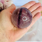 Incredible Phantom Amethyst Sphere with Rainbows 261grams On Stand