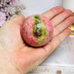 Thulite Sphere with Epidote 202g On Stand