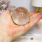 Clear Quartz Sphere With Golden Healer Inclusions 233g