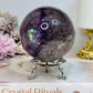 Large High Grade Phantom Amethyst Sphere with Rainbows On Stand 665g