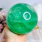 Huge High Grade Green Fluorite Sphere with Rainbows on Stand 2.4KG
