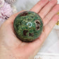 Green Sakura Agate Sphere On Stand 264g