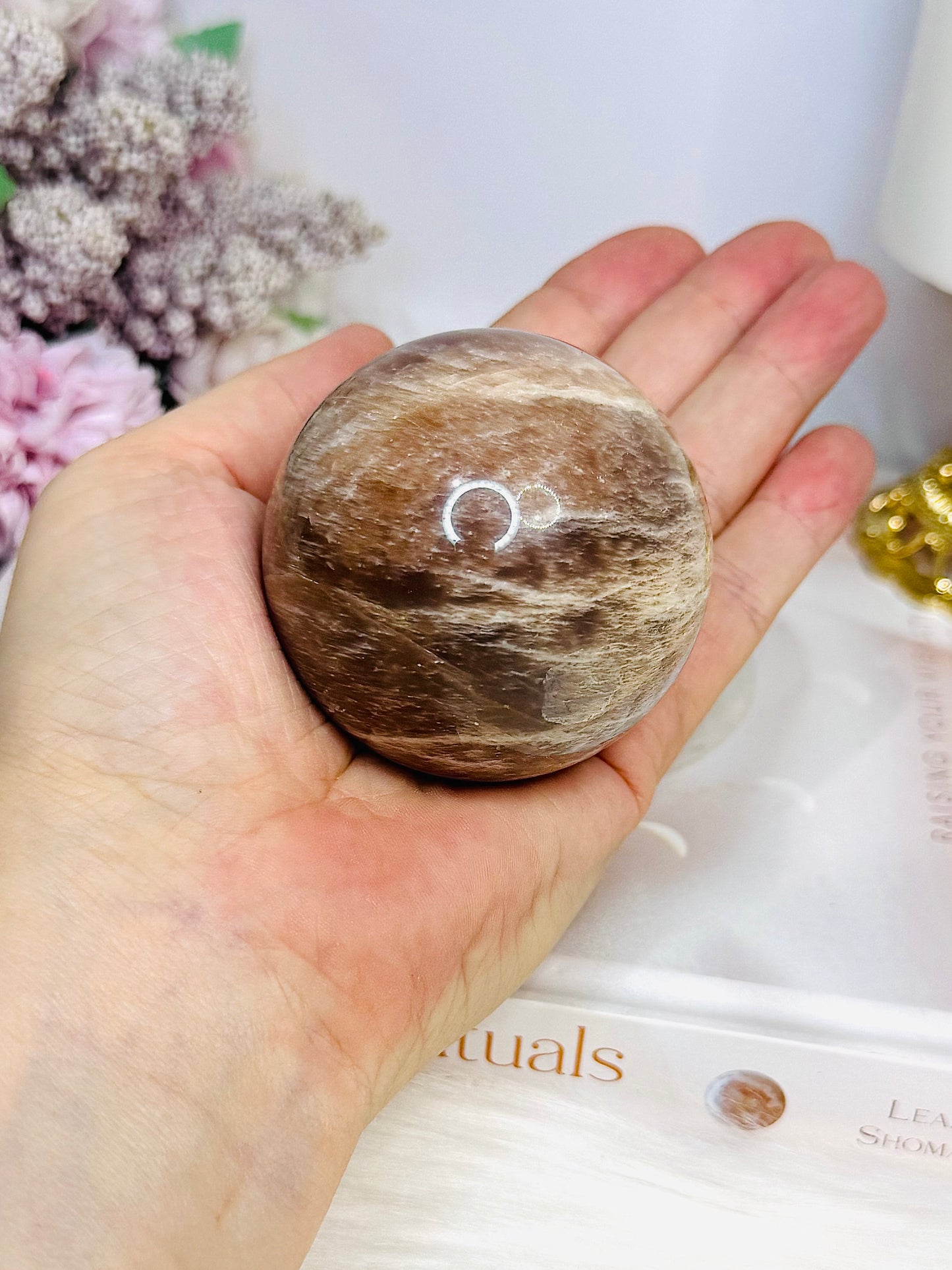 Shimmering Sunstone with Moonstone Sphere on Stand 250g