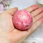 Thulite Sphere with Epidote 202g On Stand