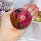 Large Rhodonite Sphere 551g On Stand
