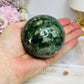 Large Green Diopside Sphere on Stand 503g