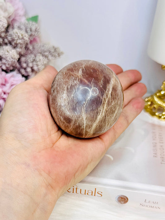 Shimmering Sunstone with Moonstone Sphere on Stand 250g