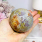 Ocean Jasper Rutile Sphere 468g On Stand