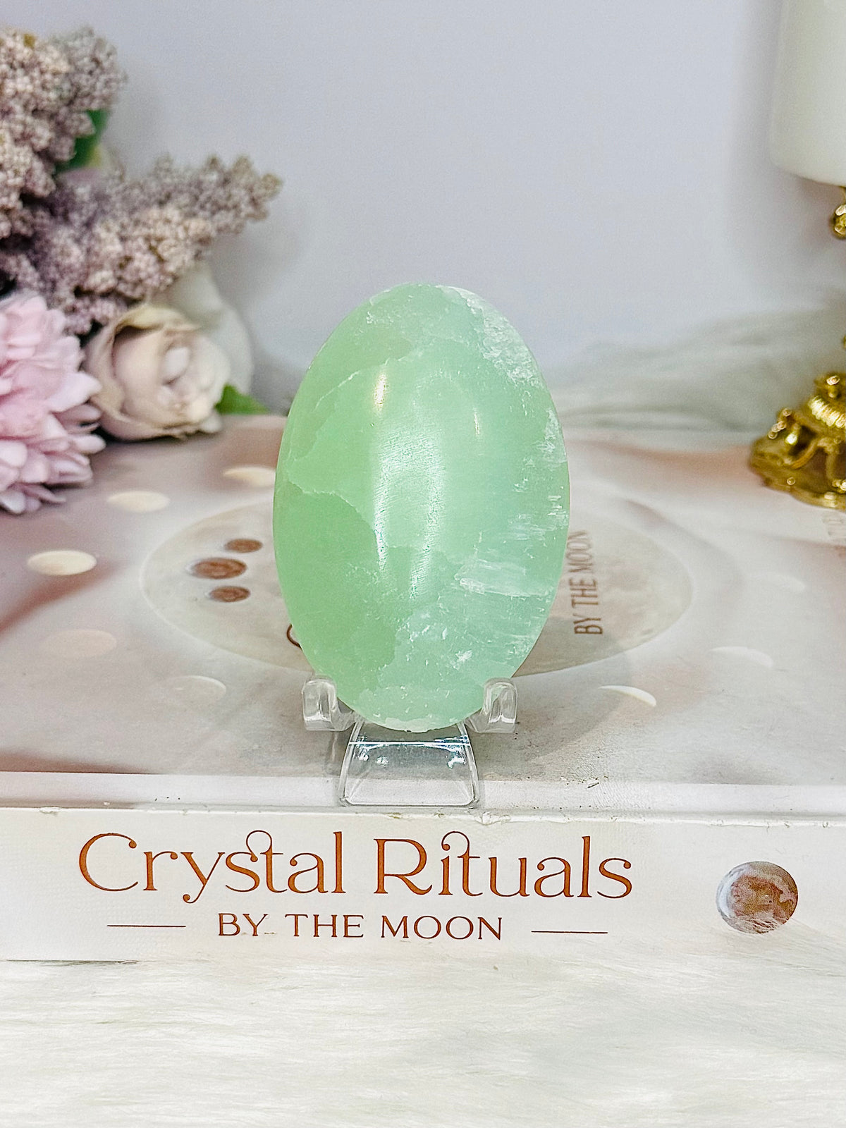 Pistachio Calcite Palm Stone (stand is display only)