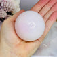 Natural Pink Mangano Calcite (UV Reactive) Sphere on Stand 291g