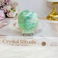 Green Moonstone Palm Stone (stand is display only)