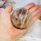 Shimmering Sunstone with Moonstone Sphere on Stand 250g