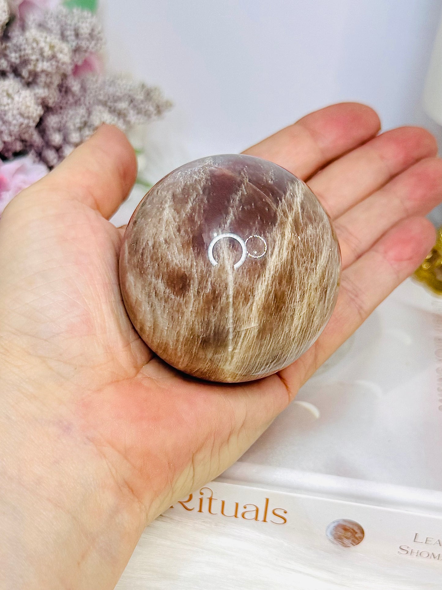 Shimmering Sunstone with Moonstone Sphere on Stand 250g