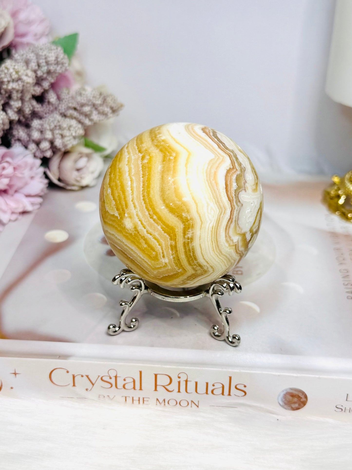 Orange Calcite Sphere on Stand 335g