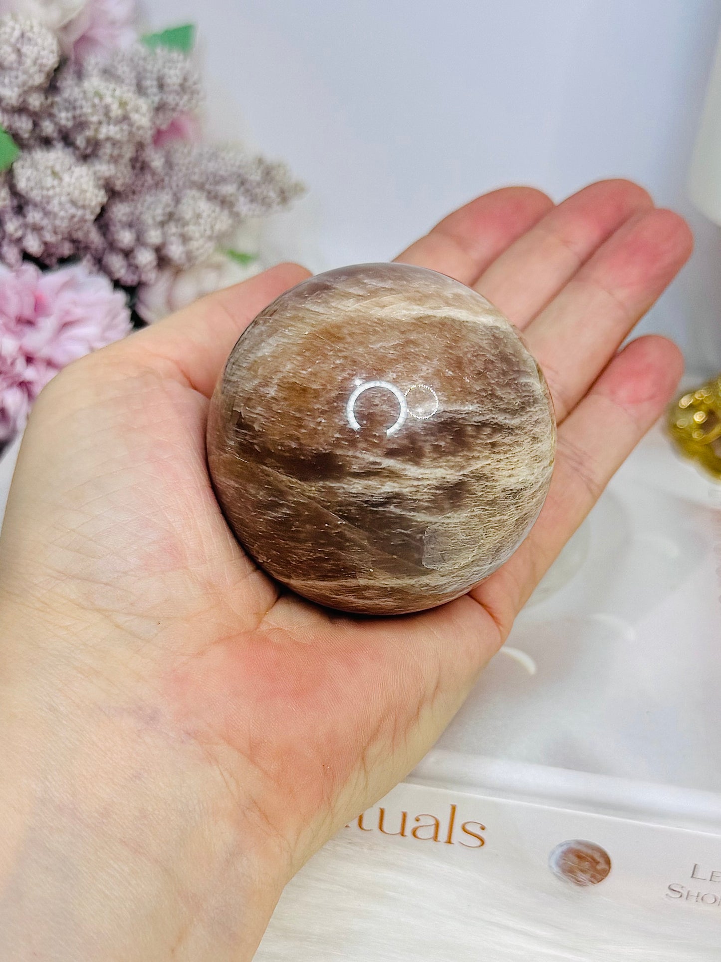Shimmering Sunstone with Moonstone Sphere on Stand 250g