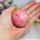 Thulite Sphere with Epidote 205g On Stand