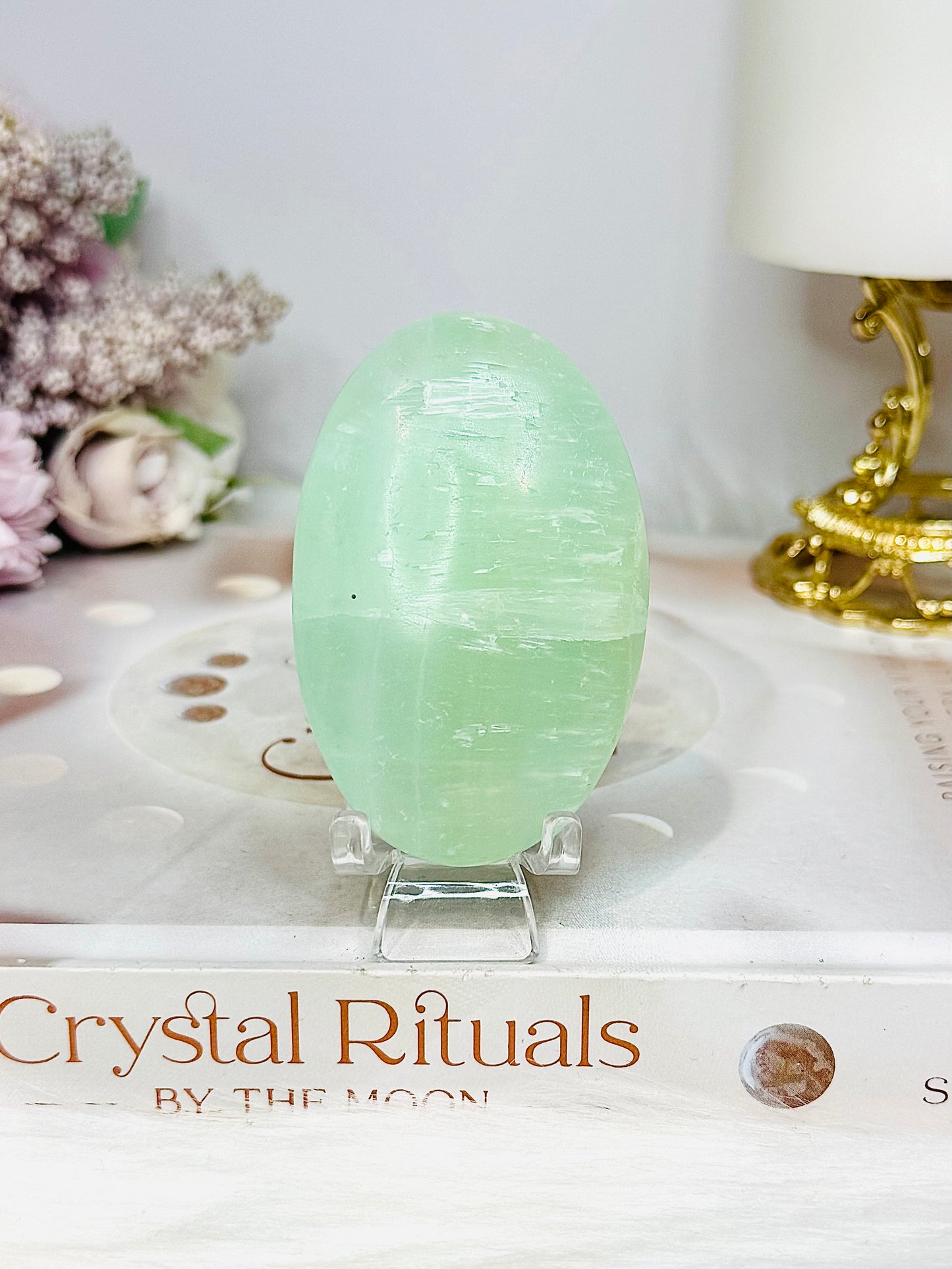 Pistachio Calcite Palm Stone (stand is display only)