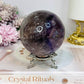 Large High Grade Phantom Amethyst Sphere with Rainbows On Stand 665g