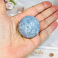Blue Calcite Round Palm Stone (stand is display only)