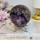 Large High Grade Phantom Amethyst Sphere with Rainbows On Stand 665g