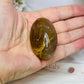 Golden Healer Palm Stone (stand is display only)