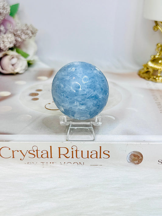 Blue Calcite Round Palm Stone (stand is display only)