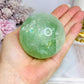 Large Green Fluorite Sphere Full of Rainbows On Stand 478g
