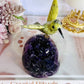 High Grade Deep Purple Amethyst Base Cut Cluster with Jade Carved Hummingbird 13cm