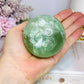 Large Green Fluorite Sphere Full of Rainbows On Stand 478g