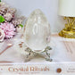 Large Clear Quartz Egg with Inclusions On Stand 7cm