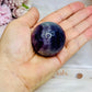 High Grade Fluorite Sphere with Rainbows 145g