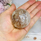 High Grade Light Smokey Quartz Sphere with Rainbows on Stand 186g