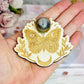 Angel Aura Druzy Sphere on Timber Moth Stand