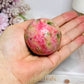 Thulite Sphere with Epidote 202g On Stand