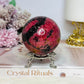 Large Rhodonite Sphere 551g On Stand