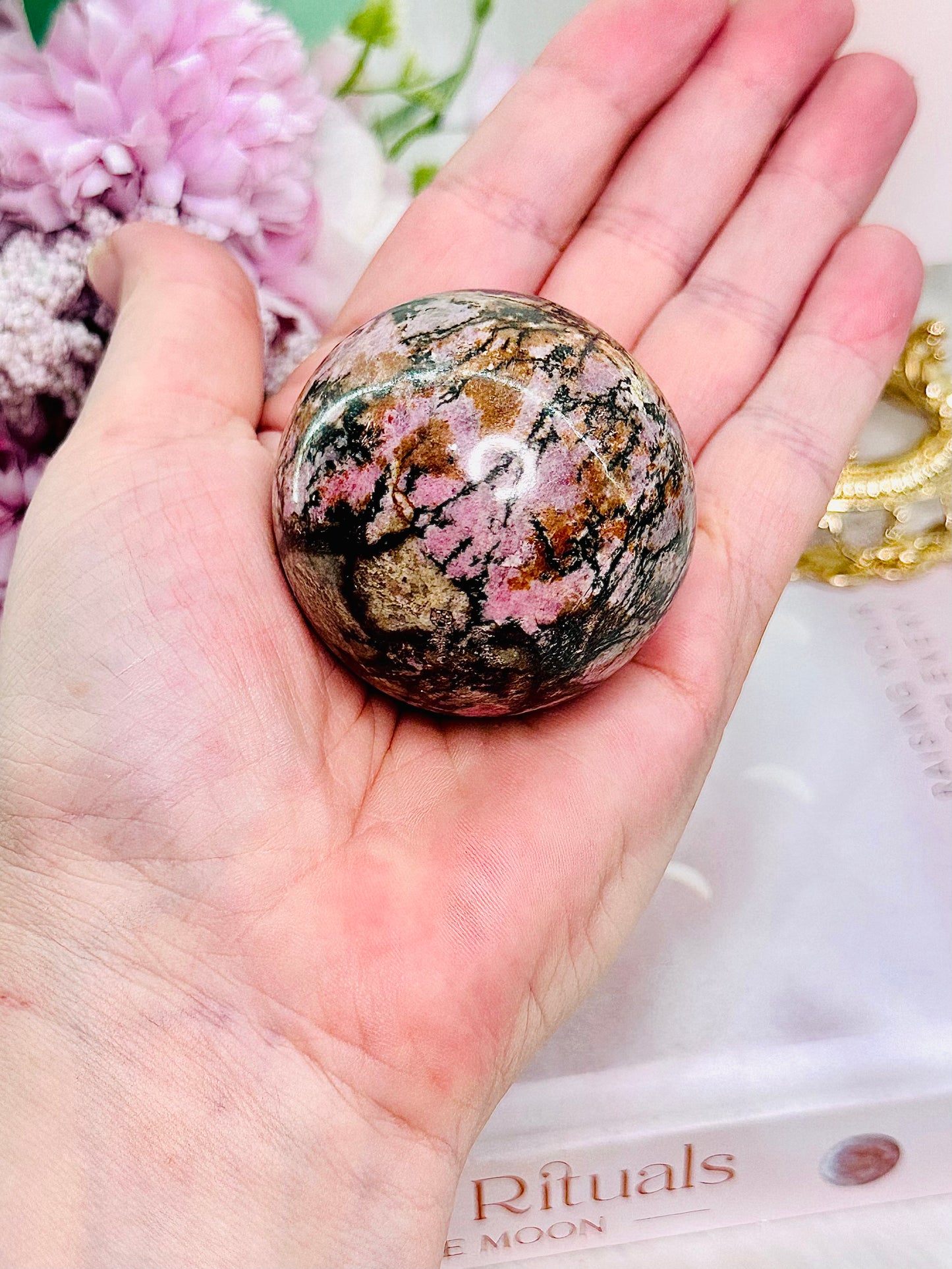 Pretty Rhodonite Sphere 5cm On Silver Stand