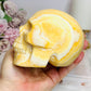 Large Orange Calcite Carved Skull 11.5cm 1.01KG