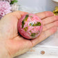 Thulite Sphere with Epidote 201g On Stand