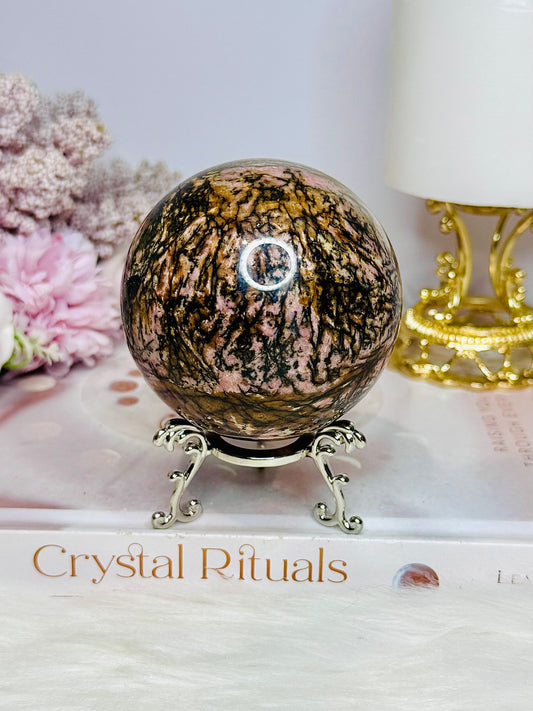 Large Rhodonite Sphere 561g On Stand