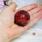 High Grade Rhodonite Sphere On Stand 168g