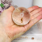 Clear Quartz Sphere With Golden Healer Inclusions 233g