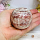 Pink Banded Calcite | Pork Stone Sphere On Stand 307g