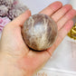 Shimmering Sunstone with Moonstone Sphere on Stand 250g