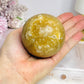 Large Amber Calcite Sphere on Stand 419g