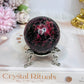 High Grade Rhodonite Sphere on Stand 270g